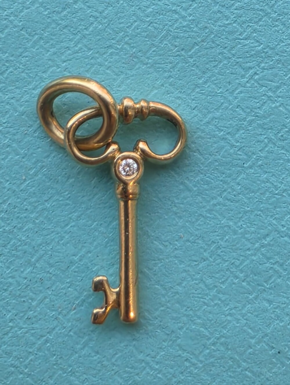 Tiffany & Co. 18k Gold Mini Diamond Key Charm